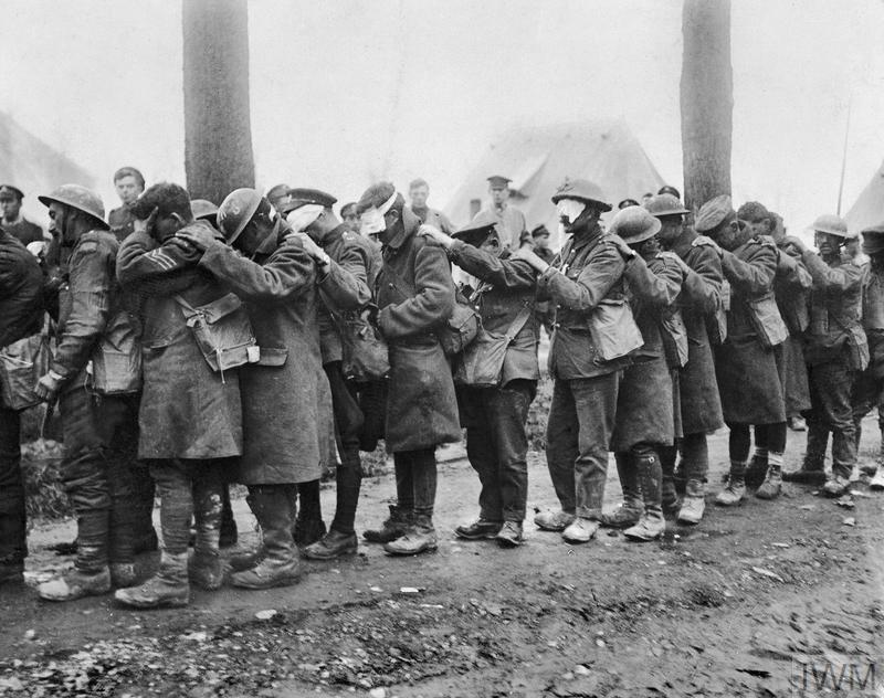 Battle of Estaires. British troops blinded by tear gas near Bethune, 10 April 1918. By Thomas Keith Aitkin © IWM (Q 11586)