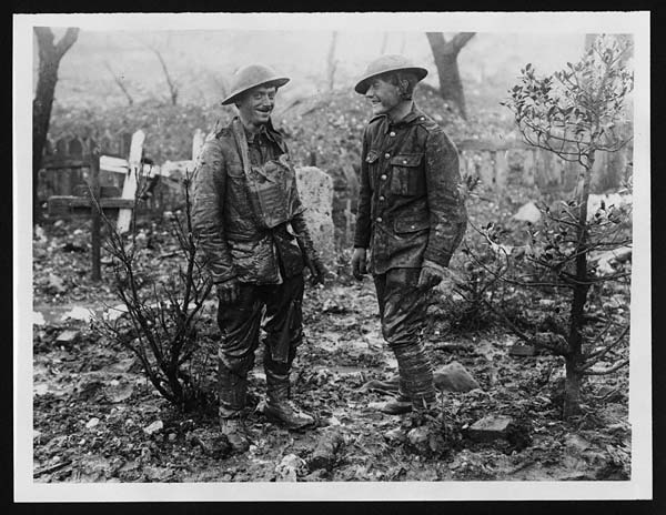 This man on the left has just been extricated from the mud into which he had sunk up to the arm pits. National Library of Scotland License CC BY 4.0
