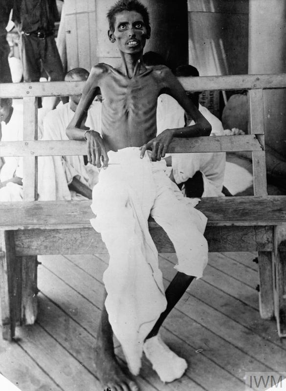 During the ensuing period of captivity in Anatolia many died from heat, disease and neglect. This emaciated Indian soldier was photographed after he had been liberated during an exchange of prisoners. © IWM (Q 79446)