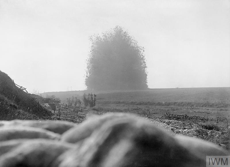 Battle of Albert. The mine under German front line positions at Hawthorn Redoubt is fired 10 minutes before the assault at Beaumont Hamel. 45,000 pounds of ammonal exploded. The crater was 130 feet across by 58 feet deep. Earnest Brookes. © IWM (Q 754)