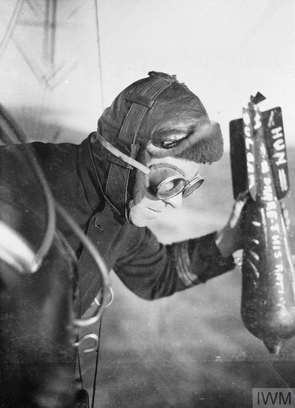 A British airman dropping a bomb.© IWM (Q 67698)