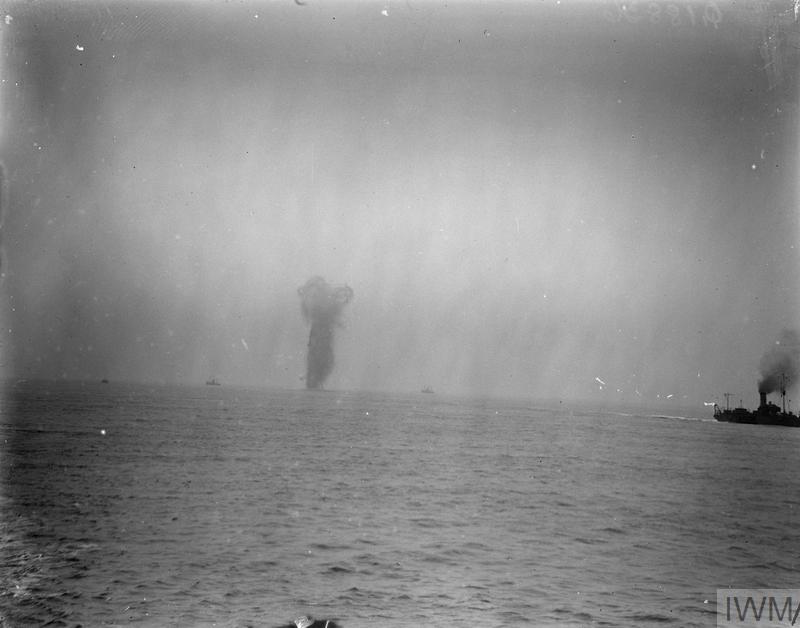 A mine exploded by rifle shots fired by sailors on a minesweeper off Harwich, Essex. © IWM (Q 18836)